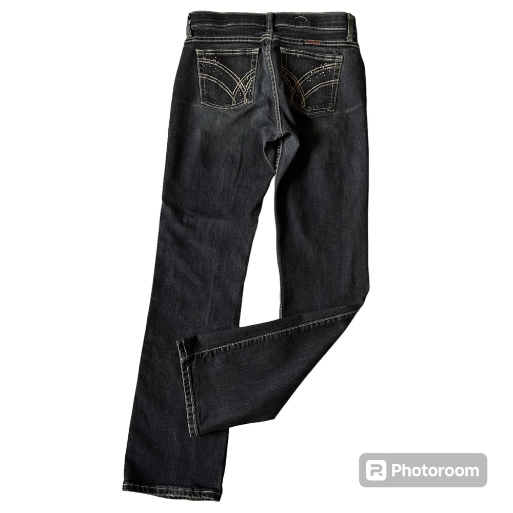 Women’s wranglers bling pocket jeans in a size  size 3/4 x 32 dark wash western